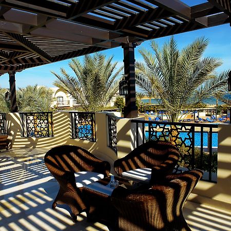 Jaz Belvedere Resort Sharm el-Sheikh Exterior foto The resort's pool area