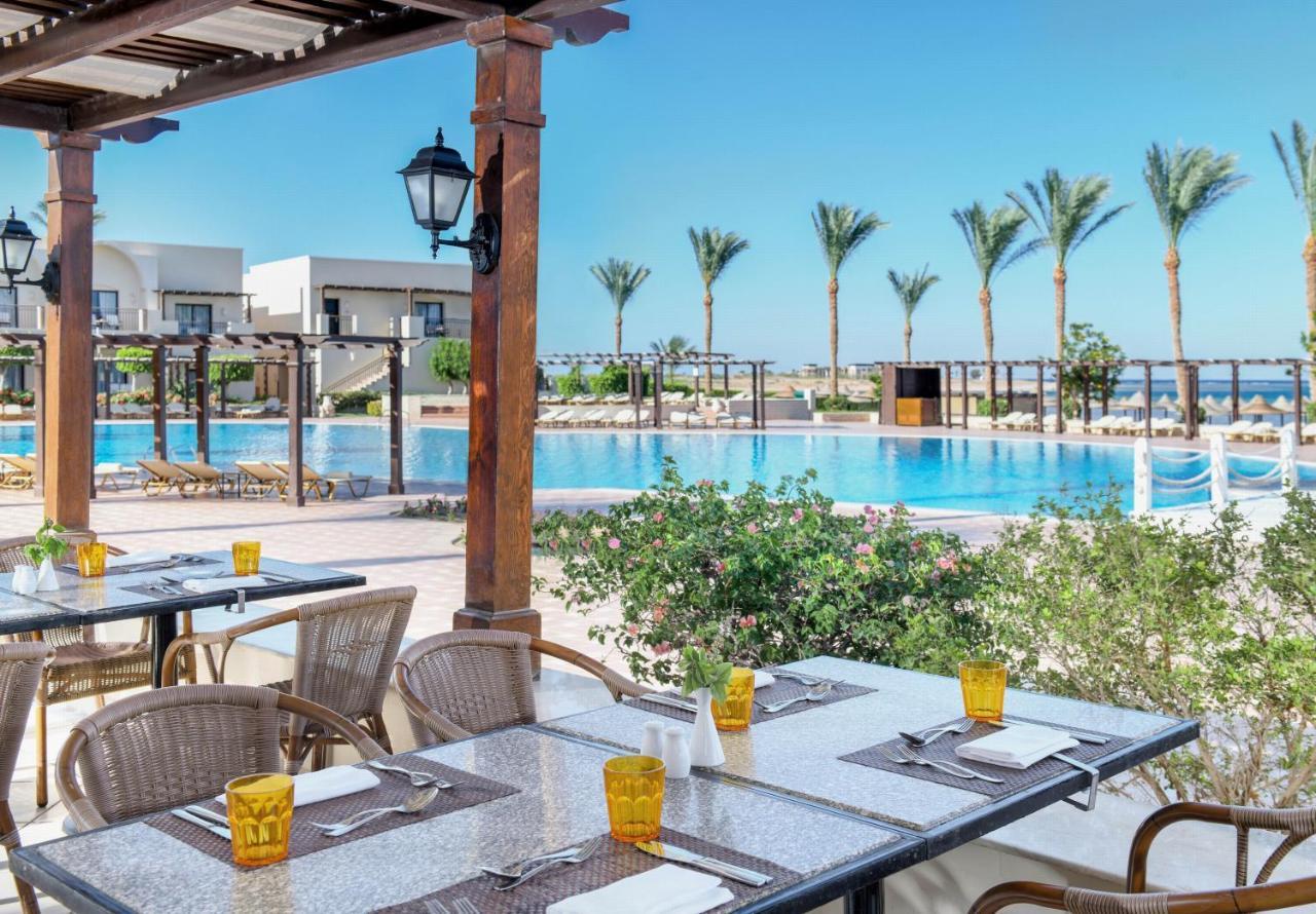 Jaz Belvedere Resort Sharm el-Sheikh Exterior foto The swimming pool at the Hilton Sharm El Sheikh