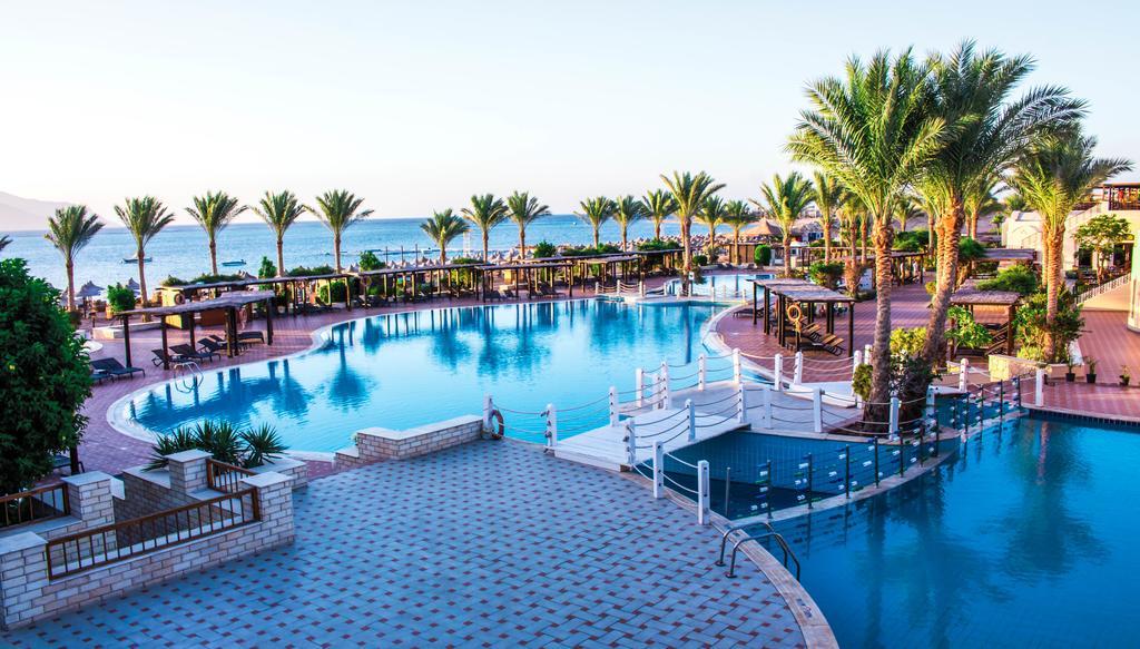 Jaz Belvedere Resort Sharm el-Sheikh Exterior foto The pool at the Hilton Sharm El Sheikh